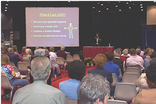 Judy Delgado at podium